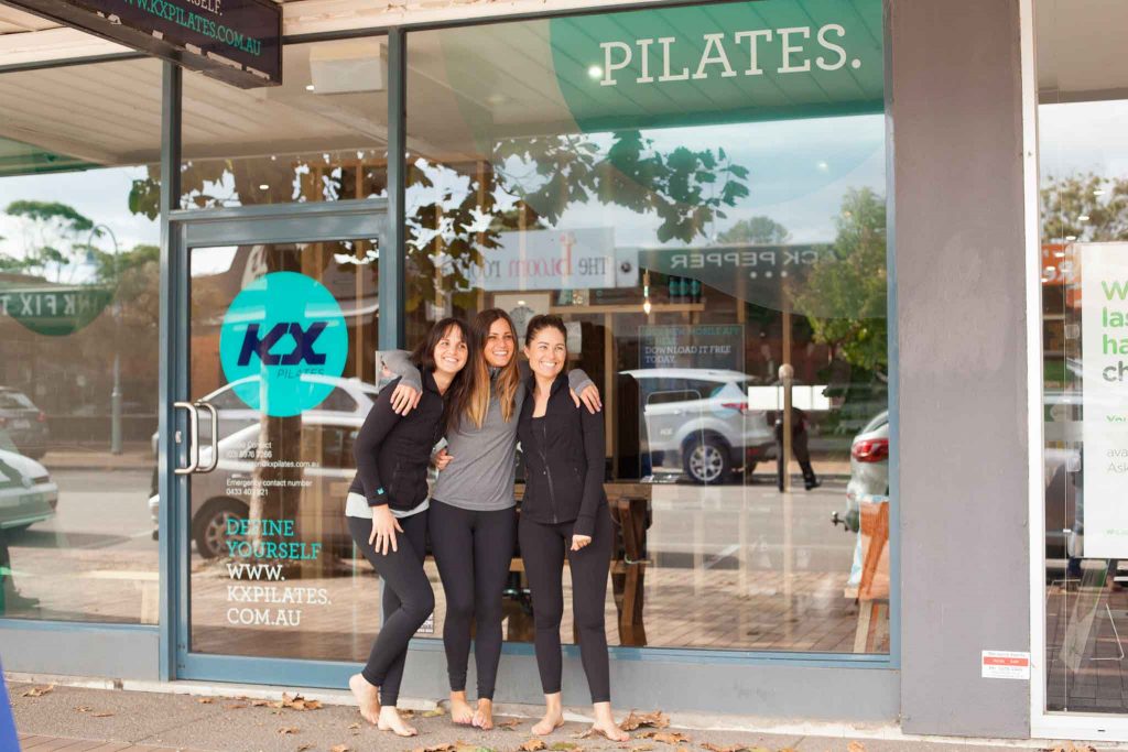 girls outside pilates studio